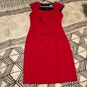 CALVIN KLEIN body hugging red dress.